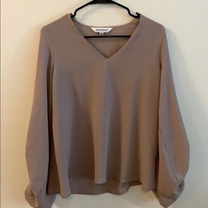 Woman’s brown/tan flowy blouse